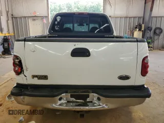 2001 Ford F-150 XLT with VIN 1FTRW07W51KE03221, listed as a Copart auction lot 63628855 with 237,510 mi miles and Salvage title. Bid and sale history available at DreamBid. Image 6.