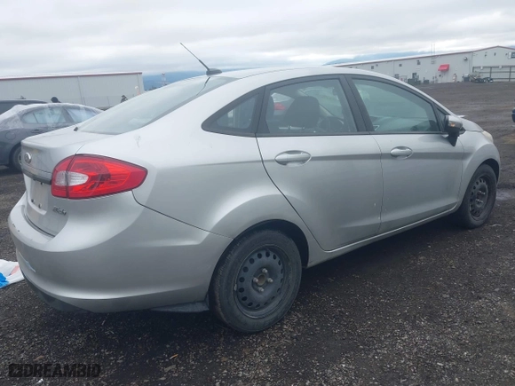 2013 Ford Fiesta SE with VIN 3FADP4BJ3DM176706, listed as a IAAI auction lot 42047063 with 126,799 mi miles. Bid and sale history available at carsss.com. Image 4.