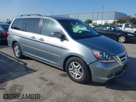 2007 Honda Odyssey EX-L with VIN 5FNRL38727B028976, listed as a IAAI auction lot 42138341 with 169,936 mi miles. Bid and sale history available at carsss.com. Image 1.