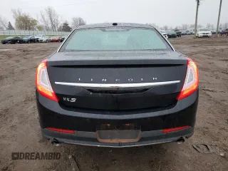 2015 Lincoln MKS with VIN 1LNHL9DK7FG606935, listed as a Copart auction lot 81991384 with 82,097 mi miles and Salvage Title. Bid and sale history available at carsss.com. Image 6.