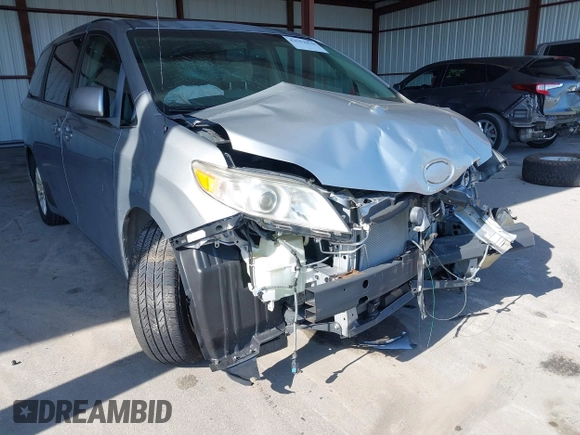 2013 Toyota Sienna XLE AAS with VIN 5TDYK3DC3DS297044, listed as a IAAI auction lot 42552470 with 143,947 mi miles and . Bid and sale history available at DreamBid. Image 18.