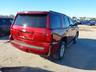 2019 Chevrolet Tahoe LT with VIN 1GNSKBKC3KR377093, listed as a IAAI auction lot 41300728 with 76,023 mi miles. Bid and sale history available at carsss.com. Image 4.