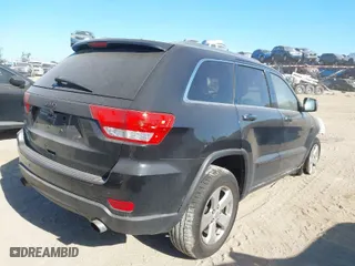2013 Jeep Grand Cherokee Limited with VIN 1C4RJFBTXDC575676, listed as a IAAI auction lot 41174929 with 1 mi miles. Bid and sale history available at carsss.com. Image 4.
