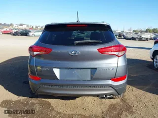 2016 Hyundai Tucson Limited with VIN KM8J33A28GU075069, listed as a IAAI auction lot 41410014 with 82,350 mi miles. Bid and sale history available at carsss.com. Image 16.