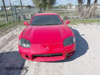 1999 Mitsubishi 3000GT z VIN JA3AM44H1XY003323, wystawiony jako IAAI lot #41560169 z przebiegiem 154 597 mil mil oraz . Historia ofert i sprzedaży dostępna na DreamBid. Obrazek 6.