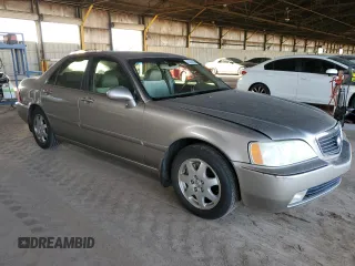 2002 Acura RL z VIN JH4KA96522C015919, wystawiony jako Copart lot #43828005 z przebiegiem 242 344 mil mil oraz Szkoda całkowita • Salvage title. Historia ofert i sprzedaży dostępna na DreamBid. Obrazek 4.