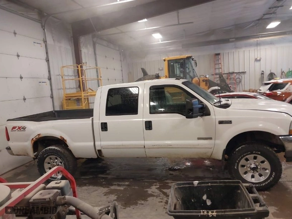 2003 Ford Super Duty F-350 SRW XL with VIN 1FTSW31P23EC17321, listed as a IAAI auction lot 41292702 with 114,178 mi miles. Bid and sale history available at carsss.com. Image 13.