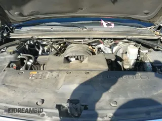 2015 Chevrolet Tahoe Commercial with VIN 1GNSK3EC8FR520563, listed as a IAAI auction lot 41643332 with 205,108 mi miles and . Bid and sale history available at DreamBid. Image 22.