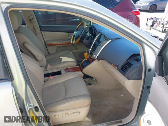 2007 Lexus RX 400h z VIN JTJGW31U272002926, wystawiony jako IAAI lot #41792083 z przebiegiem 227 063 mil mil oraz . Historia ofert i sprzedaży dostępna na DreamBid. Obrazek 5.