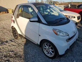 2010 Smart fortwo Pure with VIN WMEEJ3BA4AK363015, listed as a Copart auction lot 48892365 with 70,766 mi miles and Salvage title. Bid and sale history available at DreamBid. Image 4.