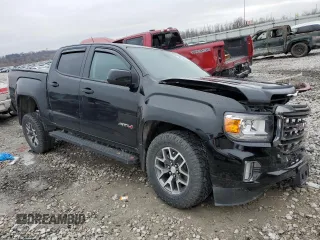 2022 GMC Canyon 4WD AT4 w/Cloth with VIN 1GTG6FENXN1105280, listed as a Copart auction lot 44232685 with 44,265 mi miles and Salvage Title. Bid and sale history available at carsss.com. Image 4.