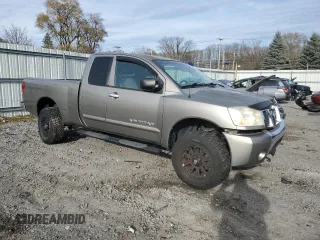 2006 Nissan Titan SE with VIN 1N6BA06B36N575815, listed as a Copart auction lot 79679104 with Not Provided miles and Salvage Title. Bid and sale history available at DreamBid. Image 4.