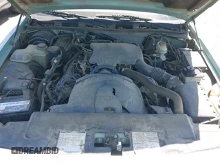 1996 Mercury Grand Marquis GS z VIN 2MELM74W3TX648820, wystawiony jako IAAI lot #42353201 z przebiegiem 125 063 mil mil oraz . Historia ofert i sprzedaży dostępna na DreamBid. Obrazek 10.
