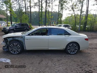 2018 Lincoln Continental Select z VIN 1LN6L9SK4J5603702, wystawiony jako IAAI lot #42198886 z przebiegiem 119 236 mil mil oraz . Historia ofert i sprzedaży dostępna na DreamBid. Obrazek 15.