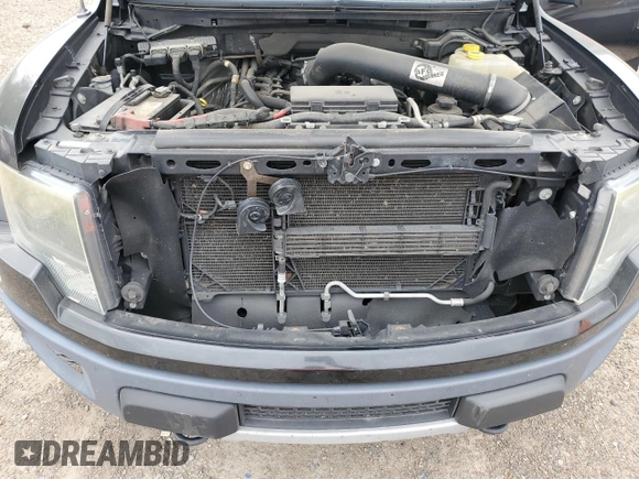 2014 Ford F-150 SVT Raptor with VIN 1FTFW1R60EFA82287, listed as a Copart auction lot 52150635 with 157,556 mi miles and Salvage Title. Bid and sale history available at carsss.com. Image 11.