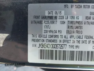 2016 Mazda CX-5 Touring with VIN JM3KE4CY3G0672977, listed as a IAAI auction lot 41889137 with 130,593 mi miles. Bid and sale history available at carsss.com. Image 9.