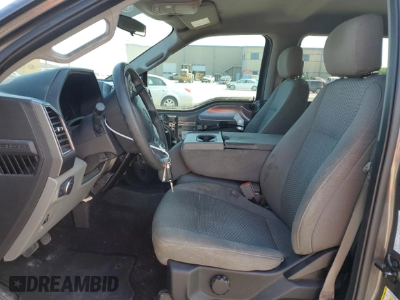 2018 Ford F-150 XL with VIN 1FTEW1CBXJKF52554, listed as a Copart auction lot 52690315 with 141,966 mi miles and Salvage Title. Bid and sale history available at carsss.com. Image 7.