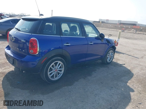 2015 MINI Countryman with VIN WMWZB3C56FWR43443, listed as a IAAI auction lot 41920848 with 91,192 mi miles and . Bid and sale history available at DreamBid. Image 4.