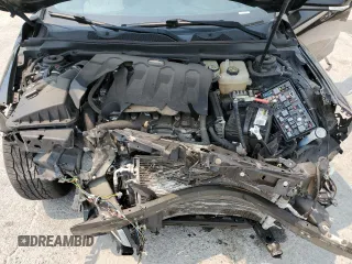 2015 Chevrolet Impala LT z VIN 1G1125S33FU147684, wystawiony jako Copart lot #52924825 z przebiegiem 128 111 mil mil oraz Szkoda całkowita • Salvage title. Historia ofert i sprzedaży dostępna na DreamBid. Obrazek 11.