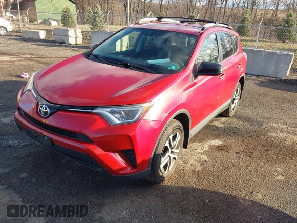 2016 Toyota RAV4 LE with VIN JTMBFREVXGJ100692, listed as a IAAI auction lot 41847333 with 130,822 mi miles. Bid and sale history available at carsss.com. Image 17.