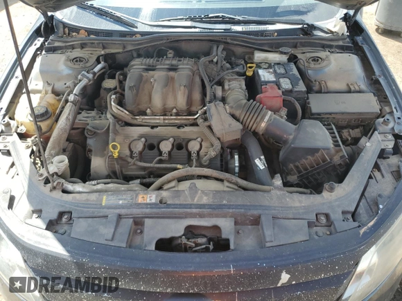 2012 Ford Fusion SEL z VIN 3FAHP0JG7CR297174, wystawiony jako Copart lot #55469005 z przebiegiem 129 434 mil mil oraz Szkoda całkowita • Salvage title. Historia ofert i sprzedaży dostępna na DreamBid. Obrazek 11.
