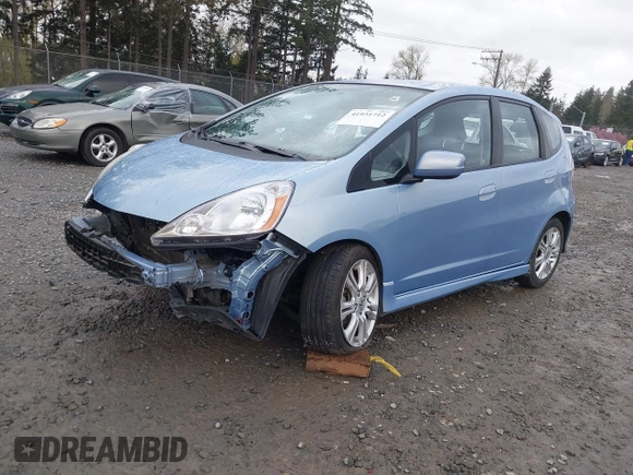 2009 Honda Fit Sport w/Navi with VIN JHMGE886X9S042490, listed as a IAAI auction lot 41931712 with 111,088 mi miles. Bid and sale history available at carsss.com. Image 18.
