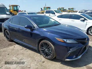 2022 Toyota Camry XSE z VIN 4T1K61AK6NU033304, wystawiony jako IAAI lot #42102716 z przebiegiem 67 825 mil mil oraz . Historia ofert i sprzedaży dostępna na DreamBid. Obrazek 1.