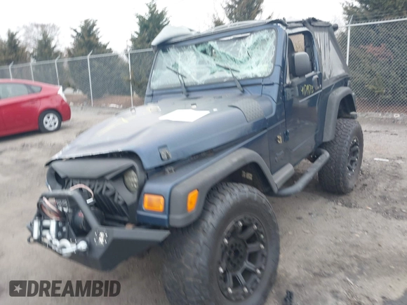 2003 Jeep Wrangler X with VIN 1J4FA39S23P300447, listed as a IAAI auction lot 41791733 with 165,576 mi miles. Bid and sale history available at carsss.com. Image 6.