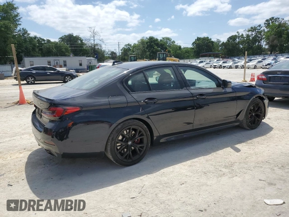 2023 BMW 5 Series 530i with VIN WBA53BH04PWY02486, listed as a Copart auction lot 54519385 with 26,979 mi miles and Salvage title. Bid and sale history available at DreamBid. Image 3.