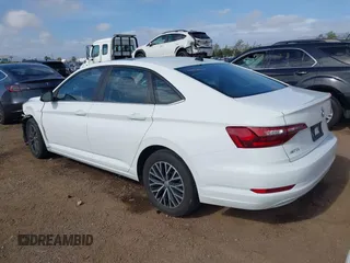 2021 Volkswagen Jetta S z VIN 3VWC57BU9MM034560, wystawiony jako IAAI lot #42239655 z przebiegiem 75 424 mil mil oraz . Historia ofert i sprzedaży dostępna na DreamBid. Obrazek 3.