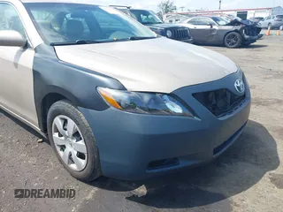 2009 Toyota Camry z VIN 4T1BE46K59U387169, wystawiony jako IAAI lot #42520259 z przebiegiem 134 501 mil mil oraz . Historia ofert i sprzedaży dostępna na DreamBid. Obrazek 6.