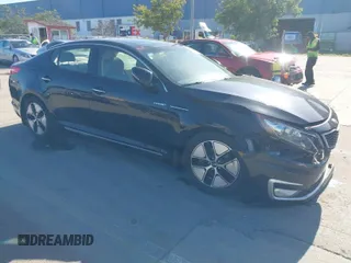 2013 Kia Optima Hybrid EX with VIN KNAGM4AD1D5050908, listed as a IAAI auction lot 41664225 with 156,957 mi miles. Bid and sale history available at carsss.com. Image 1.