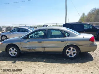2003 Ford Taurus SES Standard with VIN 1FAFP55U93A271576, listed as a IAAI auction lot 41868318 with 246,736 mi miles. Bid and sale history available at carsss.com. Image 14.