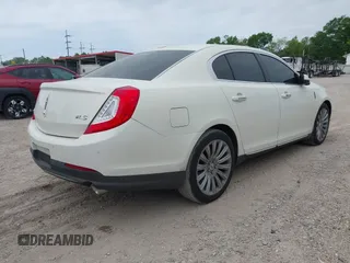 2013 Lincoln MKS with VIN 1LNHL9DKXDG604710, listed as a IAAI auction lot 42001875 with 117,724 mi miles and . Bid and sale history available at DreamBid. Image 4.