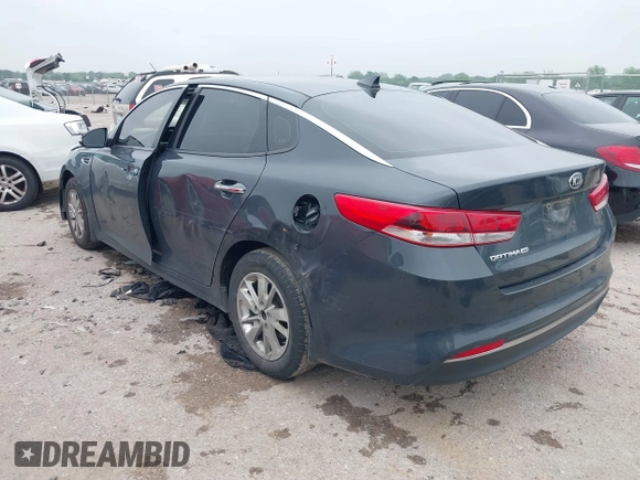 2016 Kia Optima LX z VIN KNAGT4L30G5070000, wystawiony jako IAAI lot #42169747 z przebiegiem 267 498 mil mil oraz . Historia ofert i sprzedaży dostępna na DreamBid. Obrazek 3.