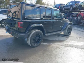 2023 Jeep Wrangler 4xe Sahara with VIN 1C4JJXP62PW613040, listed as a IAAI auction lot 41489171 with 36,818 mi miles. Bid and sale history available at carsss.com. Image 4.