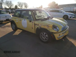 2002 MINI Hardtop with VIN WMWRC33422TC35953, listed as a Copart auction lot 42347465 with 126,890 mi miles and Salvage Title. Bid and sale history available at DreamBid. Image 4.