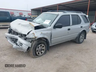 1999 Isuzu Rodeo S with VIN 4S2CK58W4X4358898, listed as a IAAI auction lot 41360738 with 184,948 mi miles and . Bid and sale history available at carsss.com. Image 17.