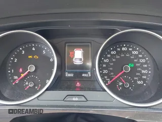 2018 Volkswagen Tiguan SEL z VIN 3VV3B7AX3JM210300, wystawiony jako IAAI lot #42189355 z przebiegiem 83 802 mil mil oraz . Historia ofert i sprzedaży dostępna na DreamBid. Obrazek 7.