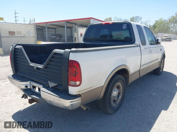 2003 Ford F-150 XL with VIN 1FTRX17L03NA16778, listed as a IAAI auction lot 41602179 with 219,101 mi miles. Bid and sale history available at carsss.com. Image 4.