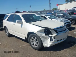 2008 Cadillac SRX RWD z VIN 1GYEE637180145363, wystawiony jako IAAI lot #42062999 z przebiegiem 300 925 mil mil oraz . Historia ofert i sprzedaży dostępna na DreamBid. Obrazek 1.