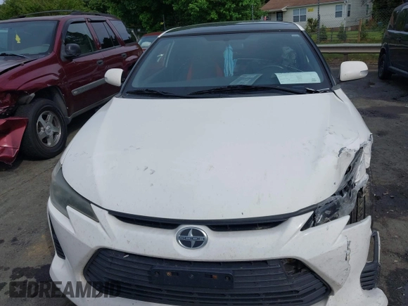 2014 Scion tC z VIN JTKJF5C77E3082073, wystawiony jako IAAI lot #42107615 z przebiegiem 223 895 mil mil oraz . Historia ofert i sprzedaży dostępna na DreamBid. Obrazek 12.