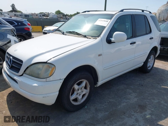 2001 Mercedes-Benz M 320/430/500 with VIN 4JGAB54E11A277233, listed as a IAAI auction lot 42519040 with 307,219 mi miles and . Bid and sale history available at DreamBid. Image 2.