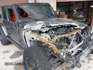 2019 Jeep Wrangler Unlimited Sahara with VIN 1C4HJXEG7KW661801, listed as a IAAI auction lot 40848731 with Not provided miles and . Bid and sale history available at DreamBid. Image 6.