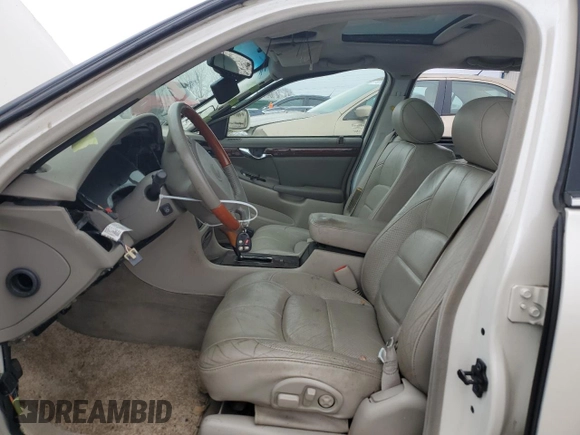 2000 Cadillac DeVille DTS z VIN 1G6KF5797YU263599, wystawiony jako Copart lot #81576484 z przebiegiem 118 414 mil mil oraz Szkoda całkowita • Salvage title. Historia ofert i sprzedaży dostępna na DreamBid. Obrazek 7.