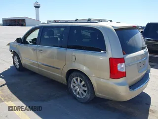 2011 Chrysler Town & Country Touring L with VIN 2A4RR8DG6BR781922, listed as a IAAI auction lot 42042313 with 155,612 mi miles and . Bid and sale history available at carsss.com. Image 3.