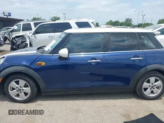 2017 MINI Hardtop 4 Door Cooper with VIN WMWXU1C59H2E18069, listed as a IAAI auction lot 42286035 with 85,835 mi miles and . Bid and sale history available at DreamBid. Image 14.