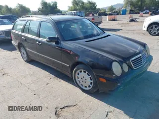 2001 Mercedes-Benz E-Class with VIN WDBJH65J31B381879, listed as a IAAI auction lot 41855504 with 153,667 mi miles. Bid and sale history available at carsss.com. Image 1.