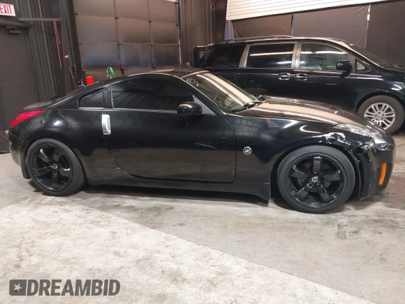 2005 Nissan 350Z Touring with VIN JN1AZ34E45M653631, listed as a IAAI auction lot 41689560 with 147,635 mi miles. Bid and sale history available at carsss.com. Image 13.