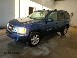 2005 GMC Envoy SLT with VIN 1GKDS13S652339845, listed as a Copart auction lot 77693684 with 220,306 mi miles and Salvage Title. Bid and sale history available at carsss.com. Image 1.